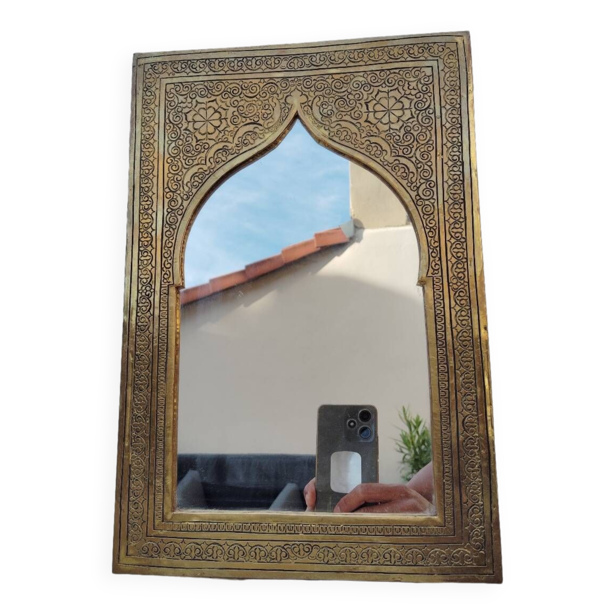 Golden oriental mirror