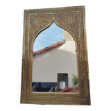 Golden oriental mirror