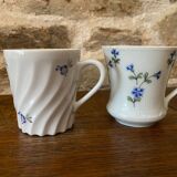 Set of 2 Istanbul and LImoges porcelain cups decorated with small blue flowers
