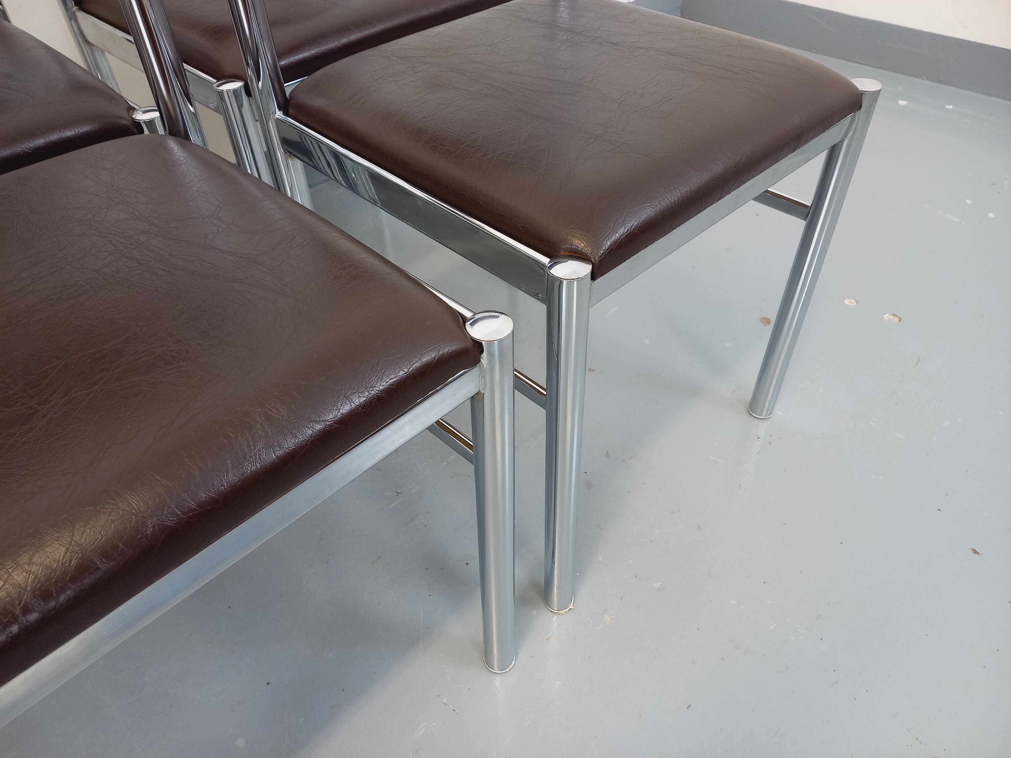 Set of 6 vintage chairs from the 70s in chrome metal and brown faux leather.