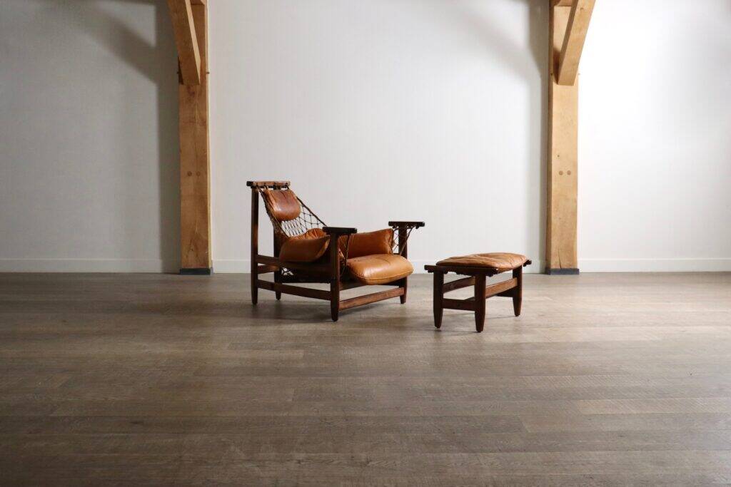 Jangada lounge chair with ottoman in cognac leather by Jean Gillon, Brazil, 1960s