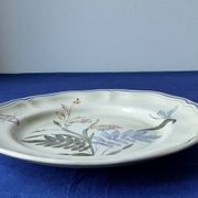 Fluted plate Longchamp, decorated with dragonflies and flowers.