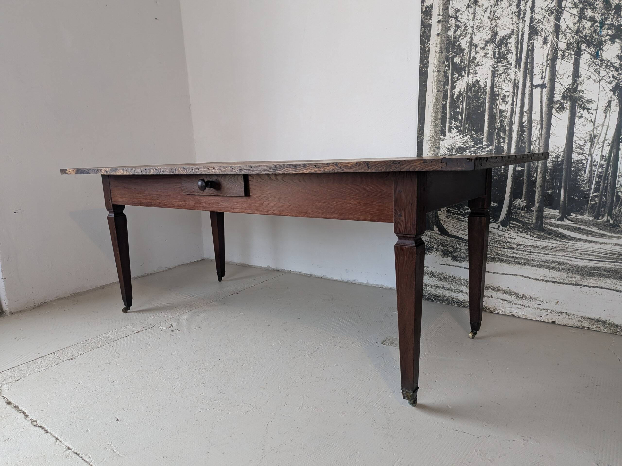 Campaign table in solid oak, Directoire style.