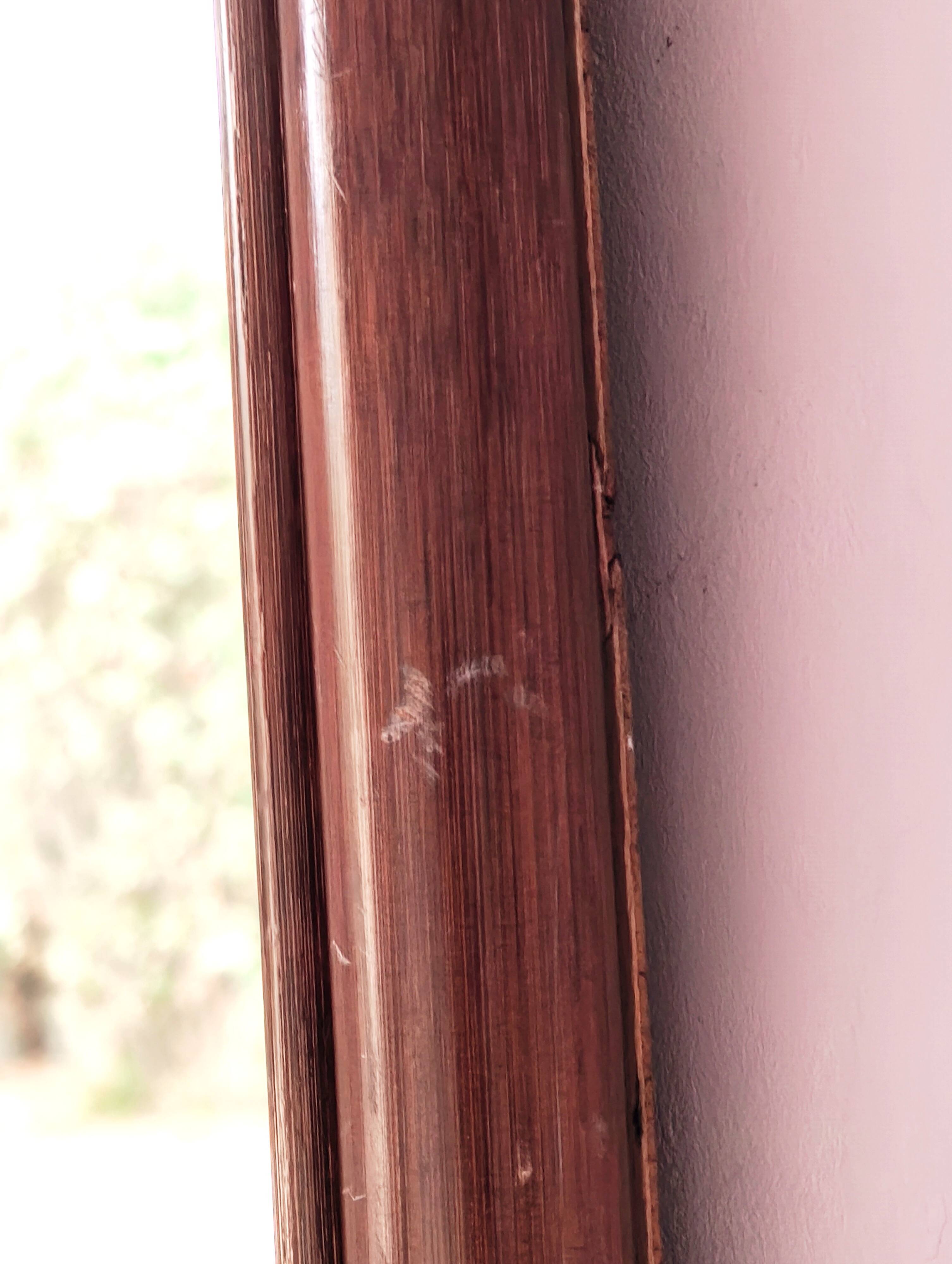 Antique mirror in bamboo and woven leather