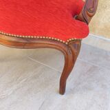 Fauteuil velours rouge