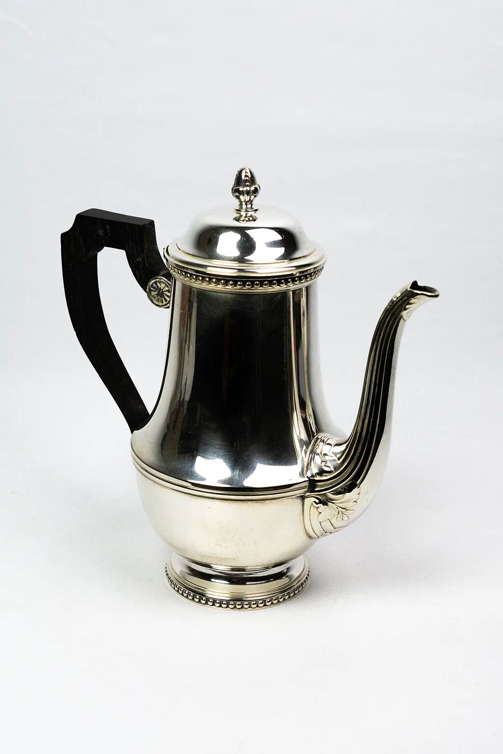 Silver-plated metal coffee pot Ercuis — decorated with bead friezes, ebony handle.