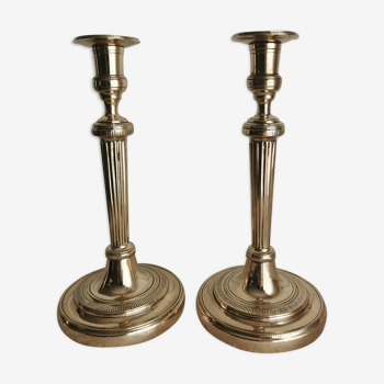 Pair of candle holders in polished bronze period late eighteenth century Louis XVI style