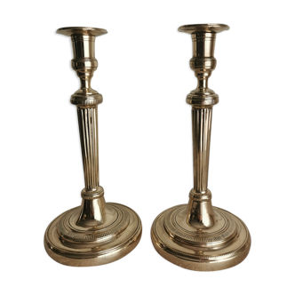 Pair of candle holders in polished bronze period late eighteenth century Louis XVI style