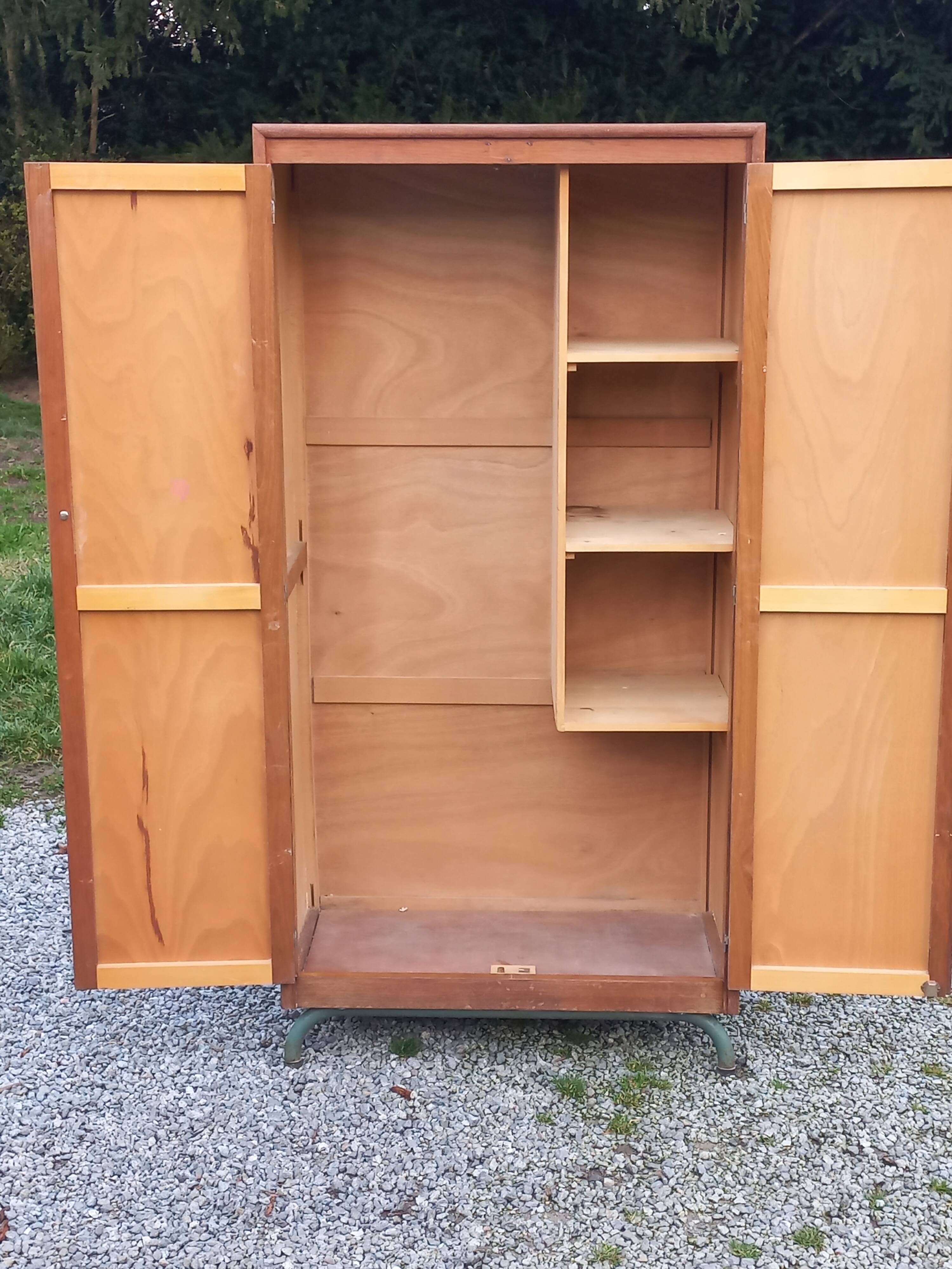 Vintage oak wardrobe with metal legs from the 1950s.
