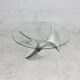"space age" coffee table. Steel legs, glass slab. Circa 1970