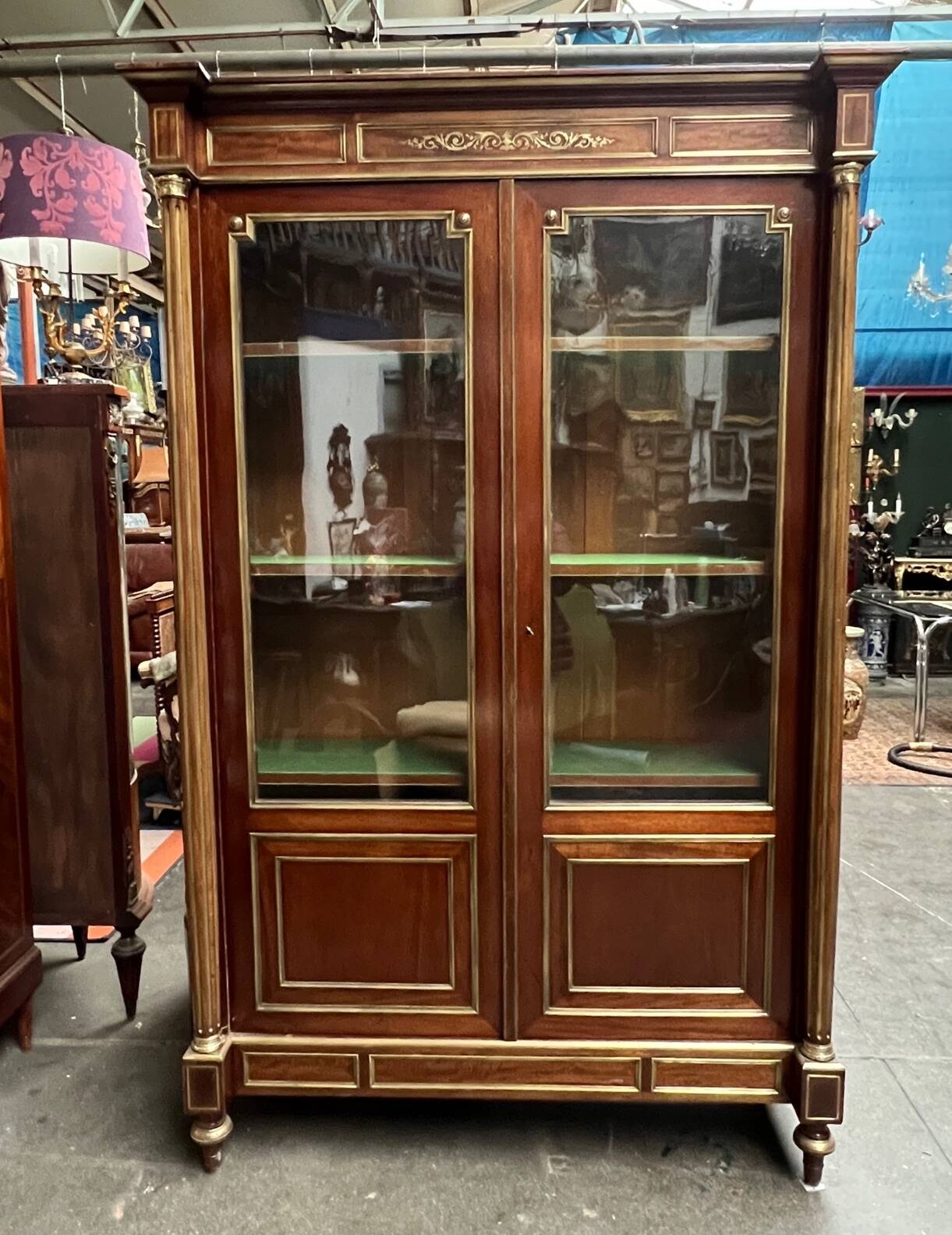 Library from the Napoléon III era. Brass inlay, mahogany, brass decoration.