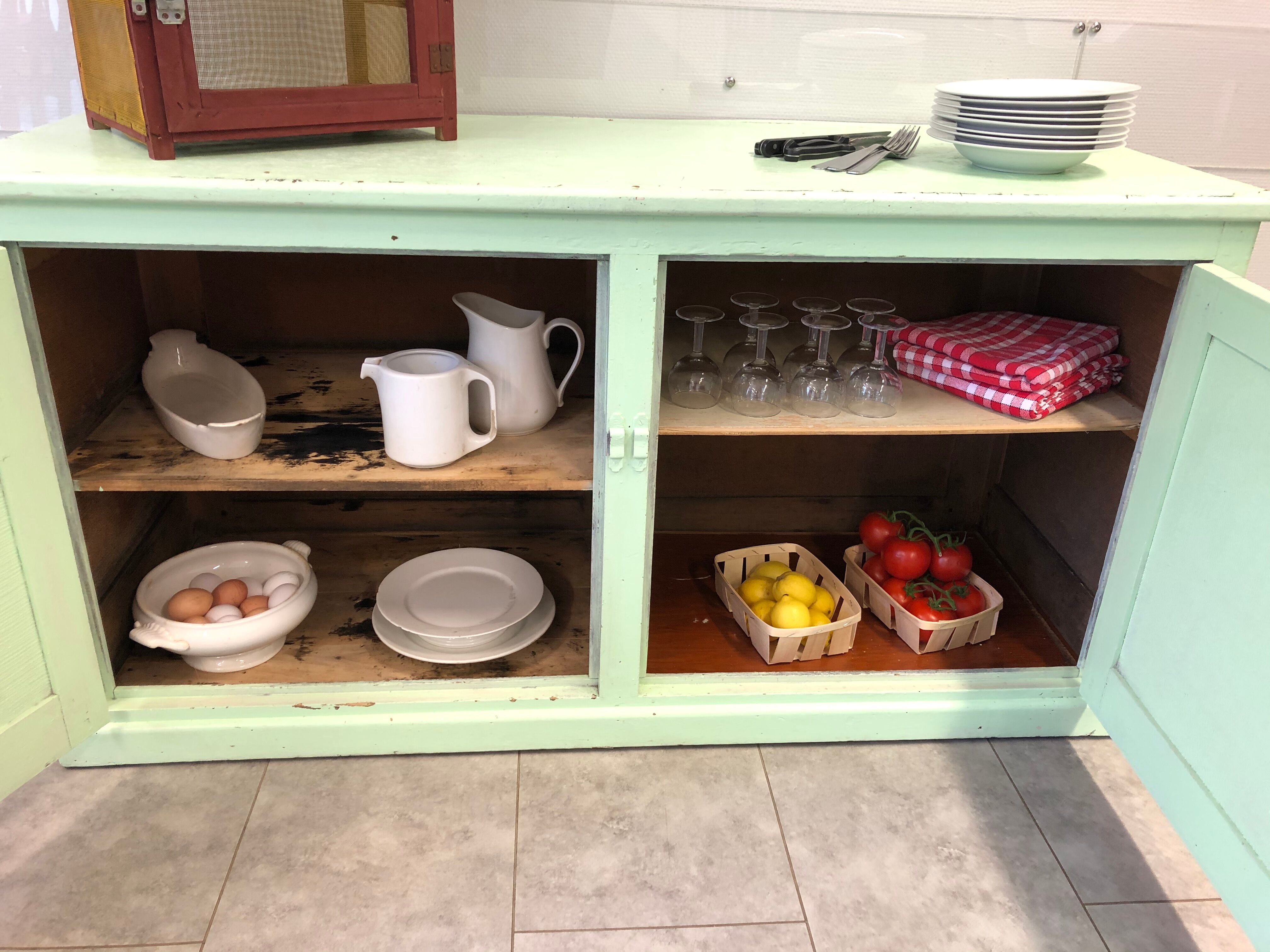 Low green patinated furniture