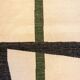 Handwoven wool tapestry with colourful geometric design. 2026.