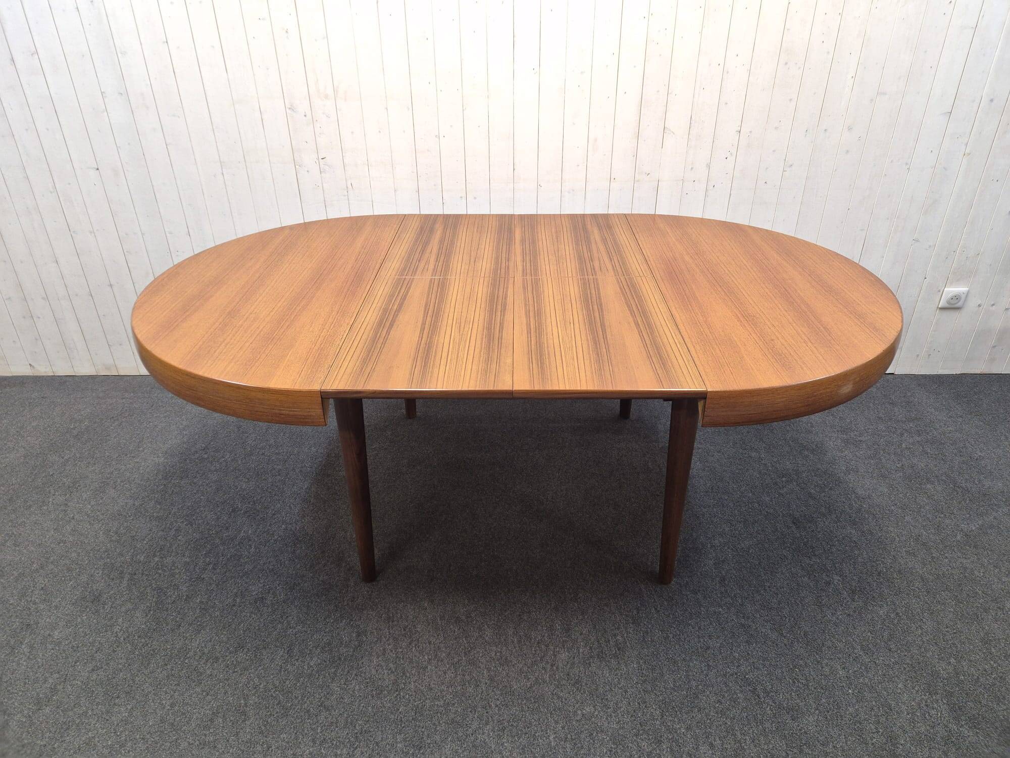 Vintage Scandinavian table with double butterfly extension.