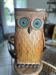 Vintage owl umbrella stand in wicker and carved wood.