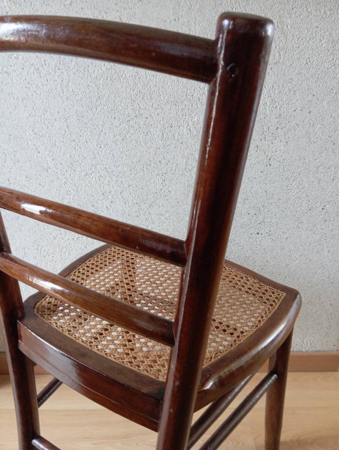 Wooden chair with cane seat, country style, around 1920
