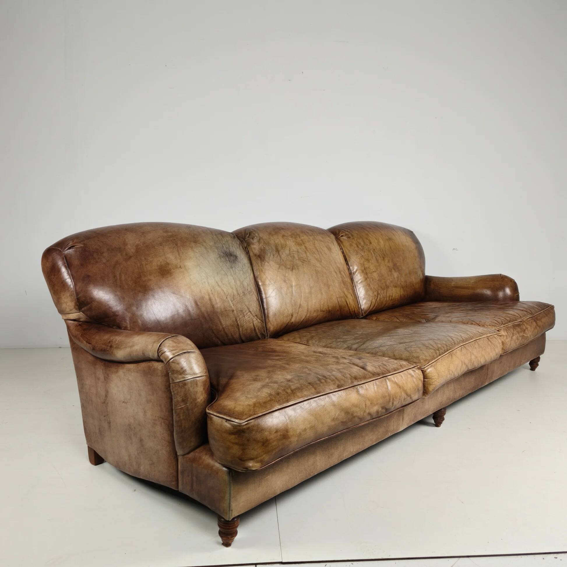 English Howard & Sons style leather sofa – 20th century