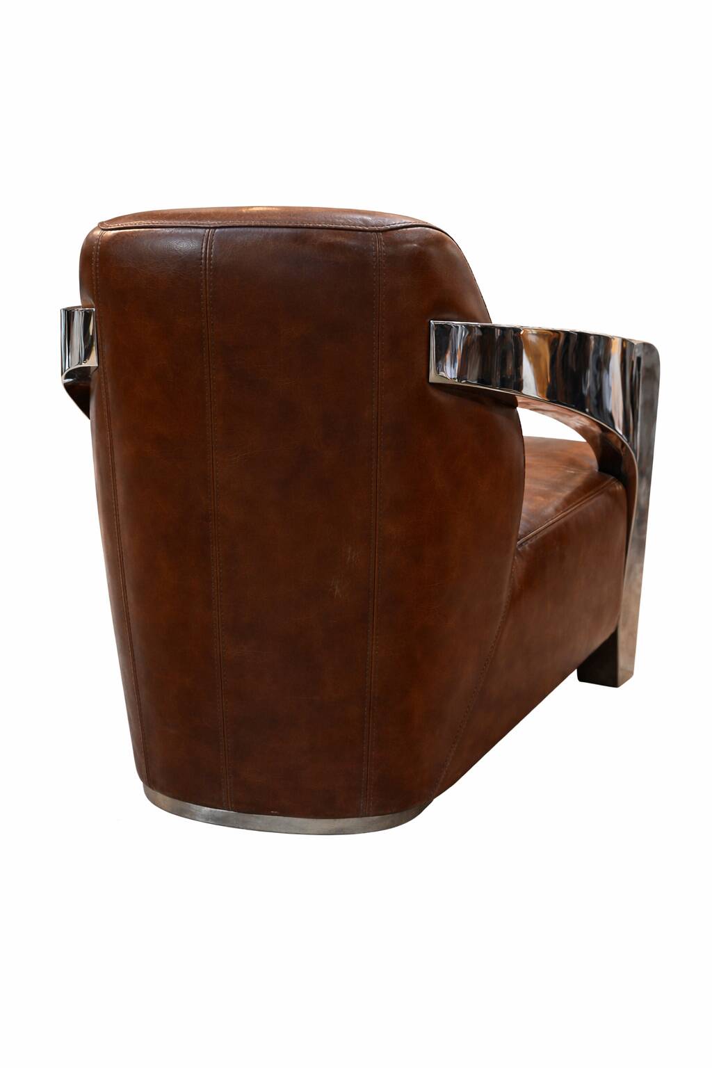 Set of 3 Stacyville items, leather and stainless steel, 2 armchairs and a sofa.