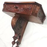 Carved wood side table. 1950s