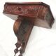 Carved wood side table. 1950s