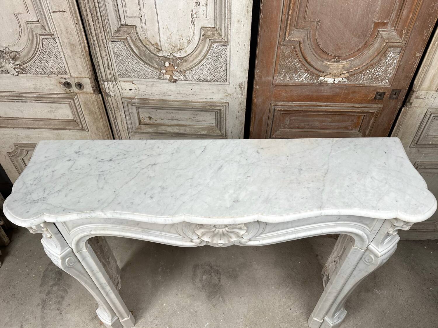 Louis XV style fireplace in white marble