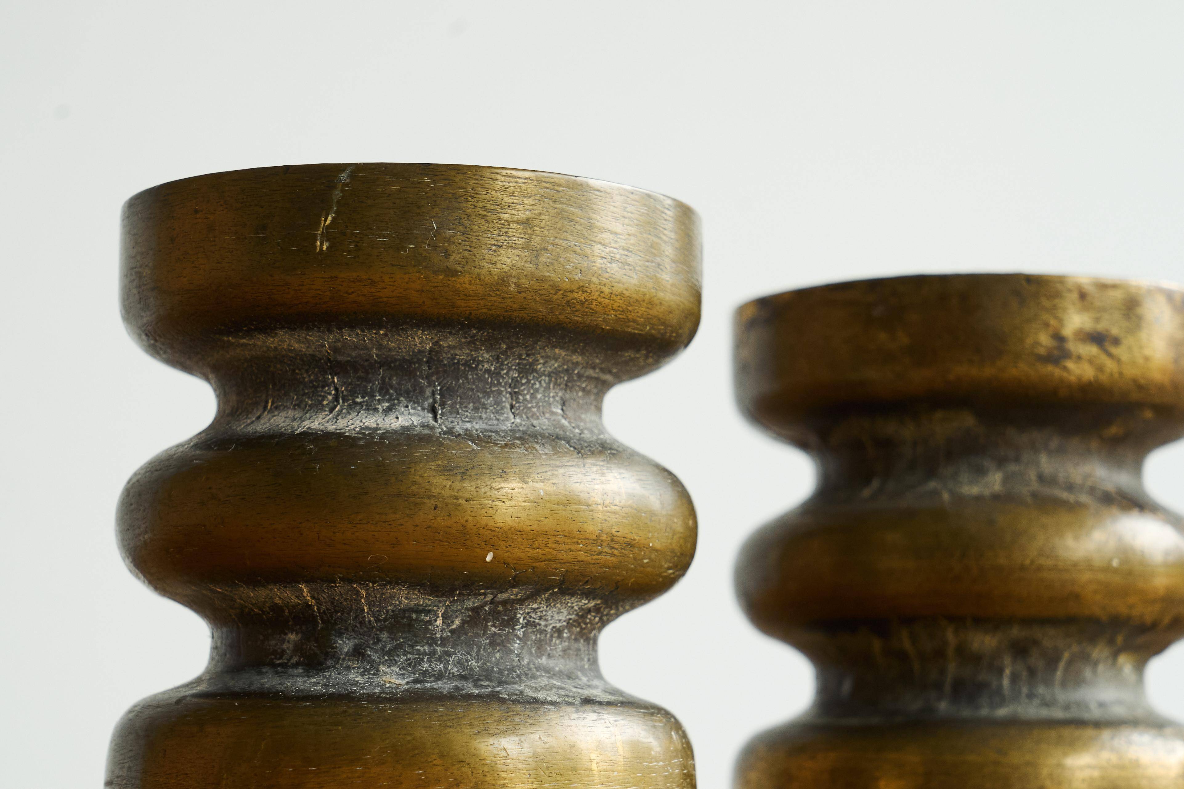 Brutalist pair of patinated bronze candle holders, 1960s
