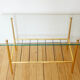 Glass coffee table with magazines holder