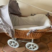 Antique rattan cradle in very good condition. Sold with or without upholstery.