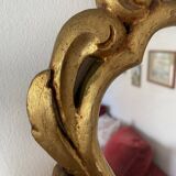 Golden mirror in baroque style.