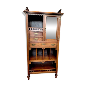 Glass-fronted music cabinet with sheet music in solid walnut, 19th century.