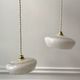 Pair of suspensions in white Clichy glass and golden edging 40s-50s
