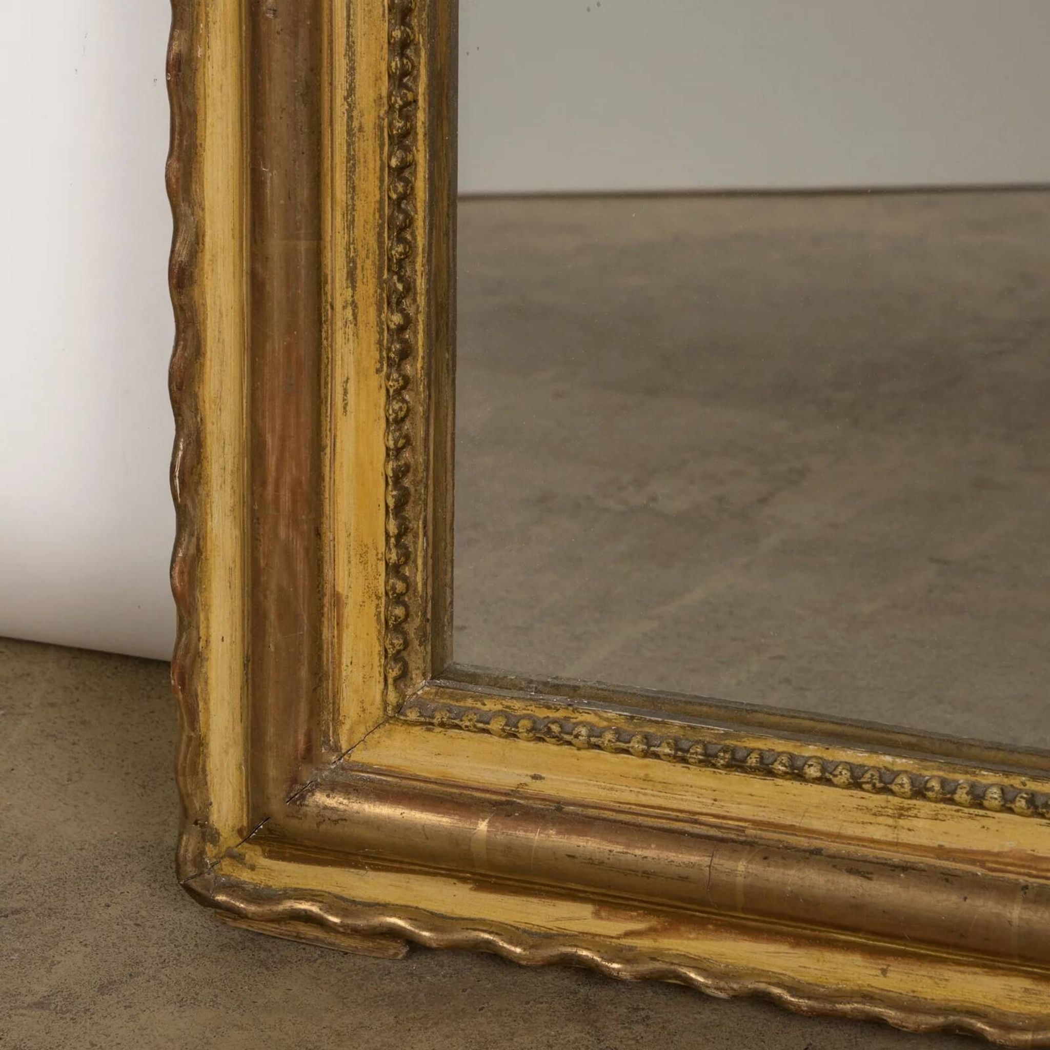 19th C antique yellow gold antique mirror with crest