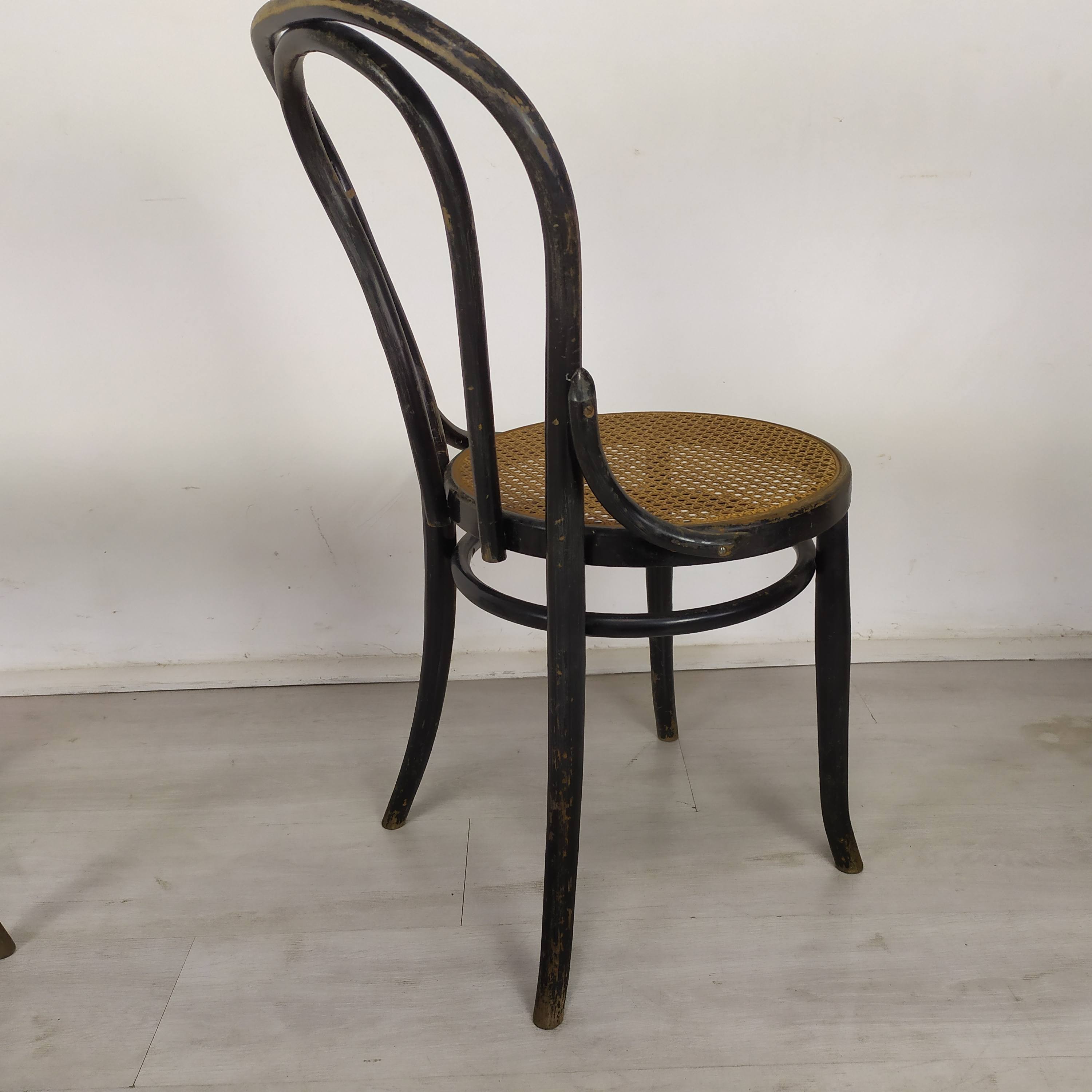 Black canned bistro chairs