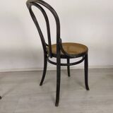 Black canned bistro chairs