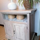 Low furniture refurbished in bleached wood
