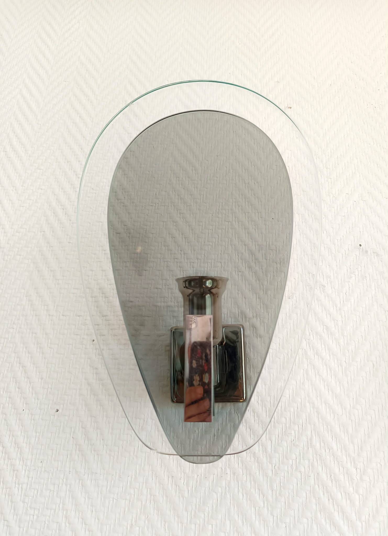 Pair of space age wall lights with smoked glass from the 1970s.