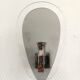 Pair of space age wall lights with smoked glass from the 1970s.