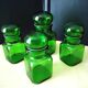 Set of 4 green glass jars, bottles from the 1970s.
