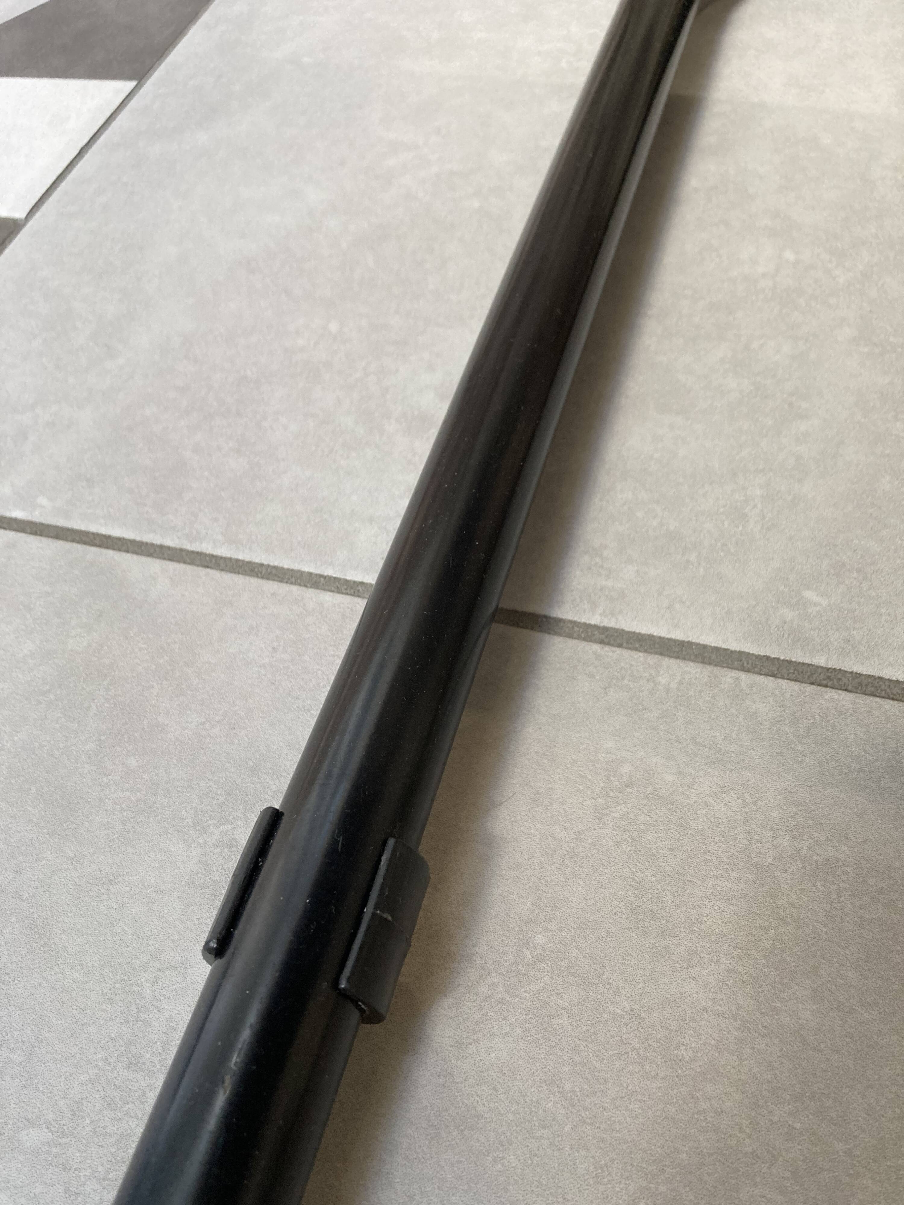 Armchair in black lacquered metal