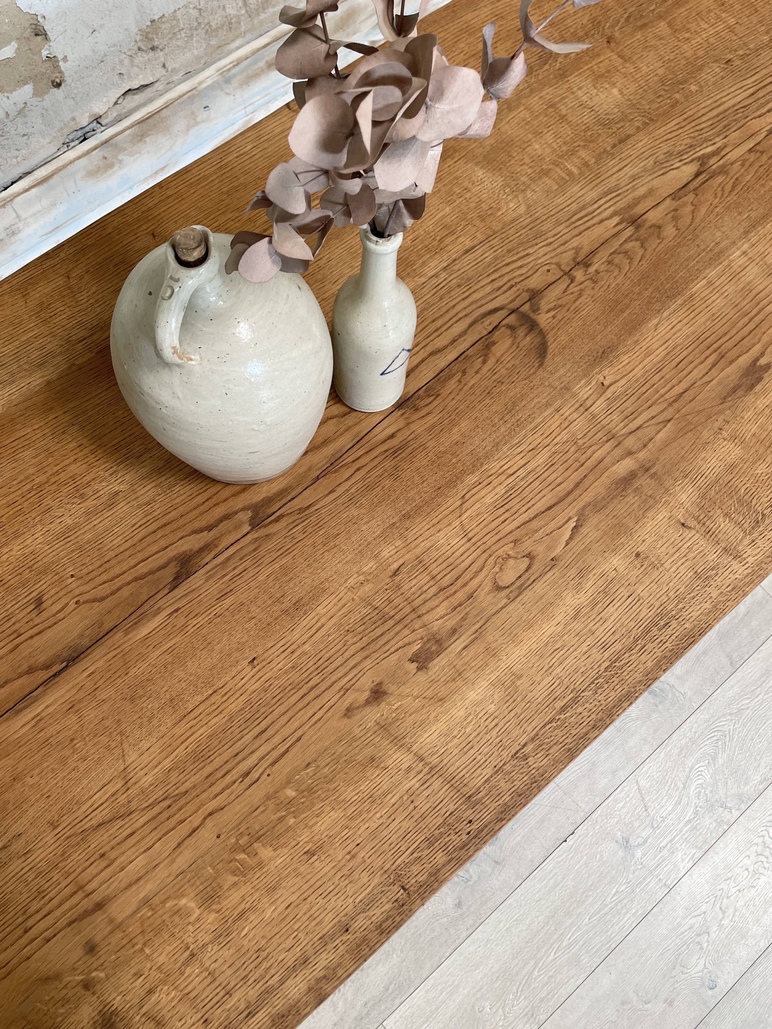 Vintage farm table with spindle legs.