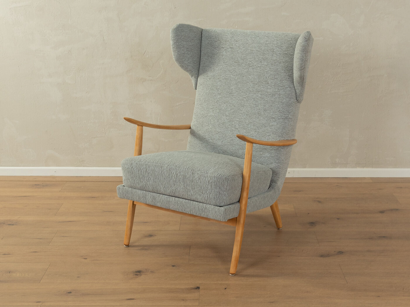 Classic wingback armchair from the 1950s