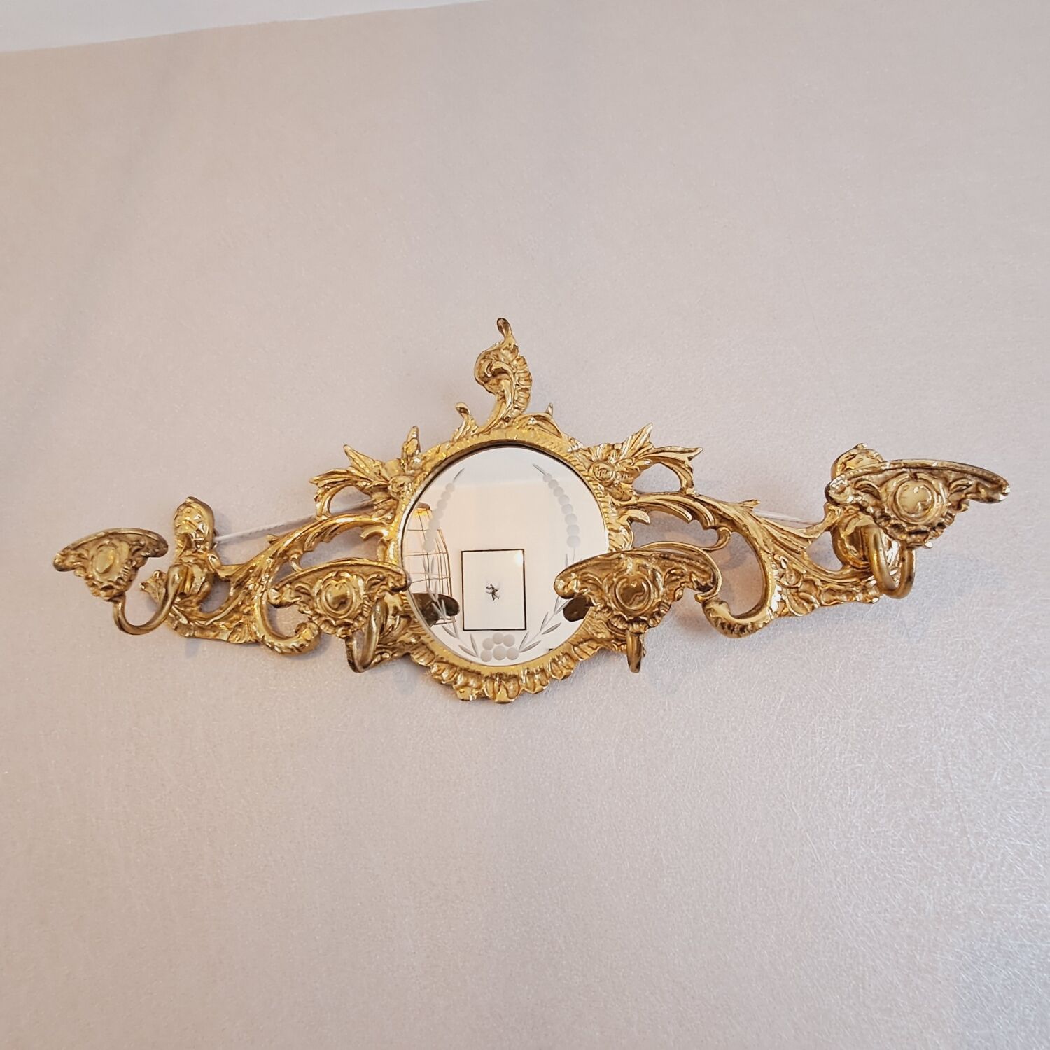 Bronze wall coat rack with chiseled mirror