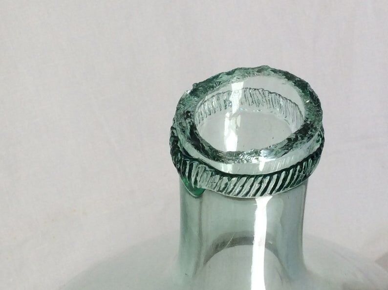 Dame-jeanne  en verre soufflé début du siècle