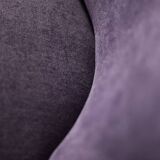 High-backed wing chair in oak and purple fabric, vintage Scandinavian style from the 1950s.