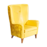 Fauteuil jaune en skaï