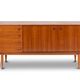 Teak sideboard, with four drawers and two doors. 20th century.