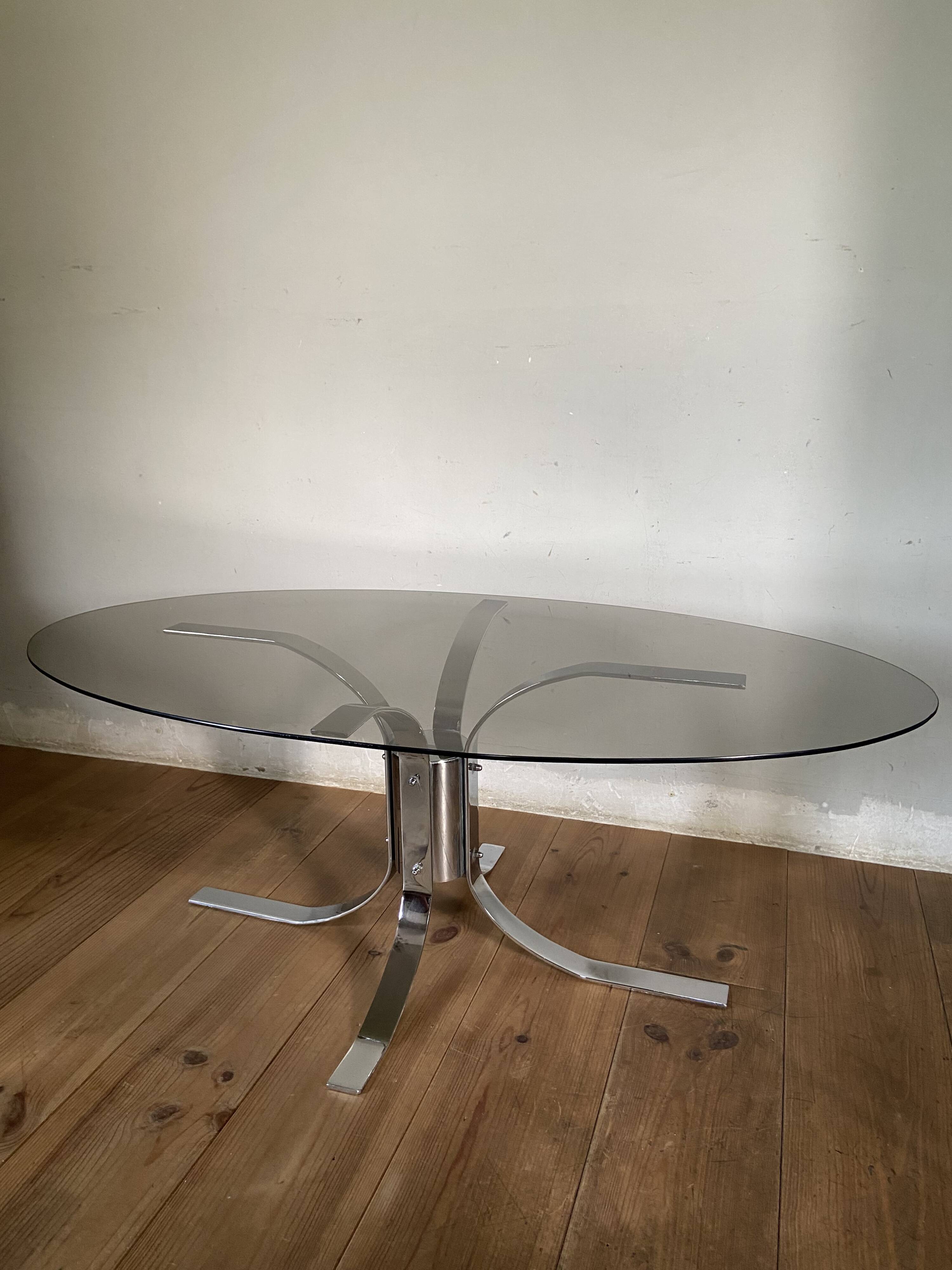 Modernist chrome and smoked glass table with tulip base from the 70s