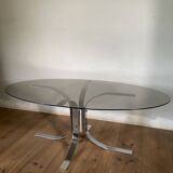 Modernist chrome and smoked glass table with tulip base from the 70s