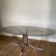 Modernist chrome and smoked glass table with tulip base from the 70s