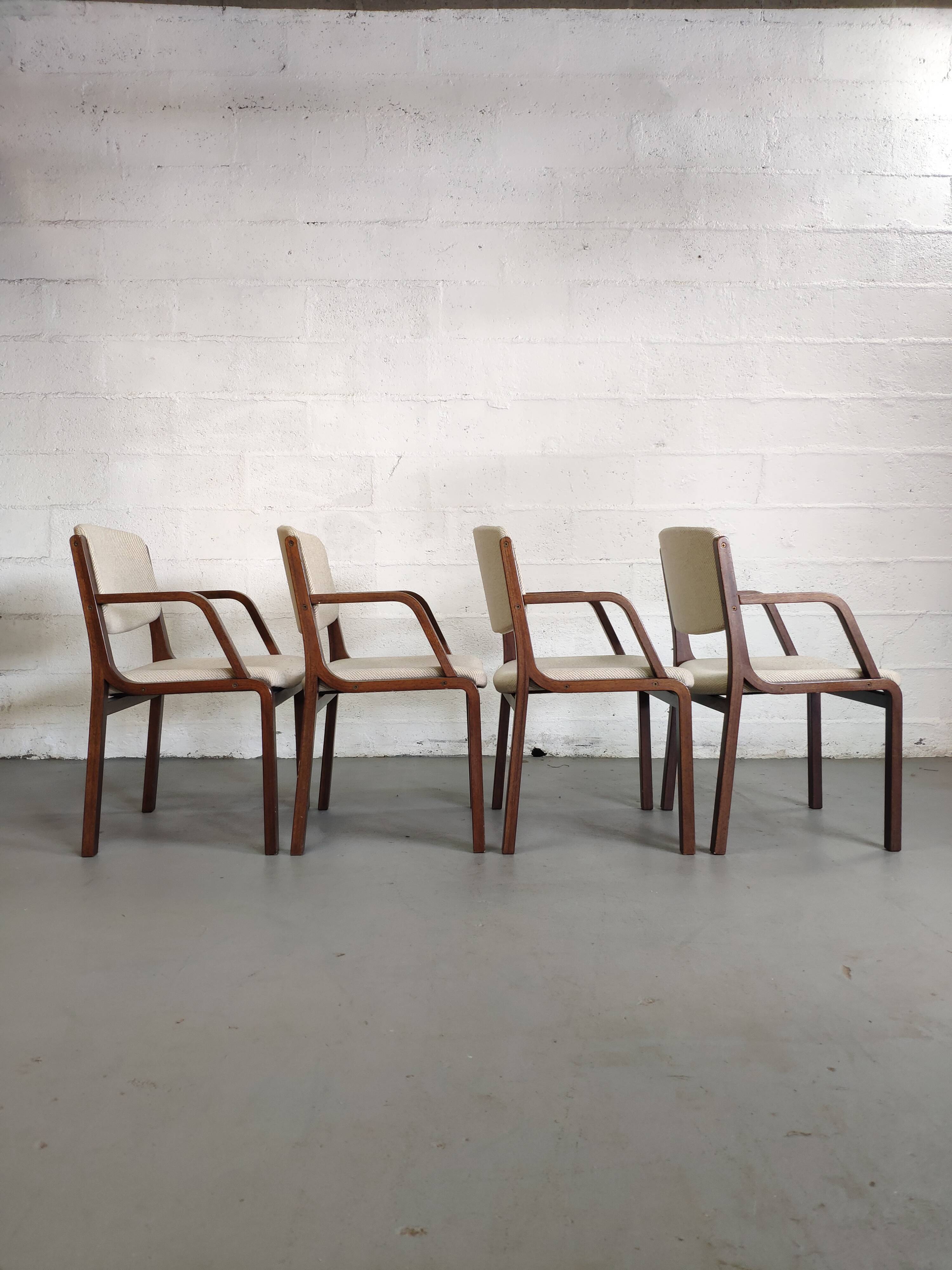 4 wooden and fabric chairs